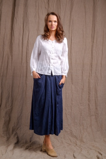 long sleeve linen top with front buttons and long navy skirt with pockets 